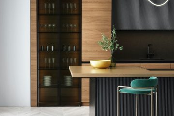 brown wooden cabinet near green and white table