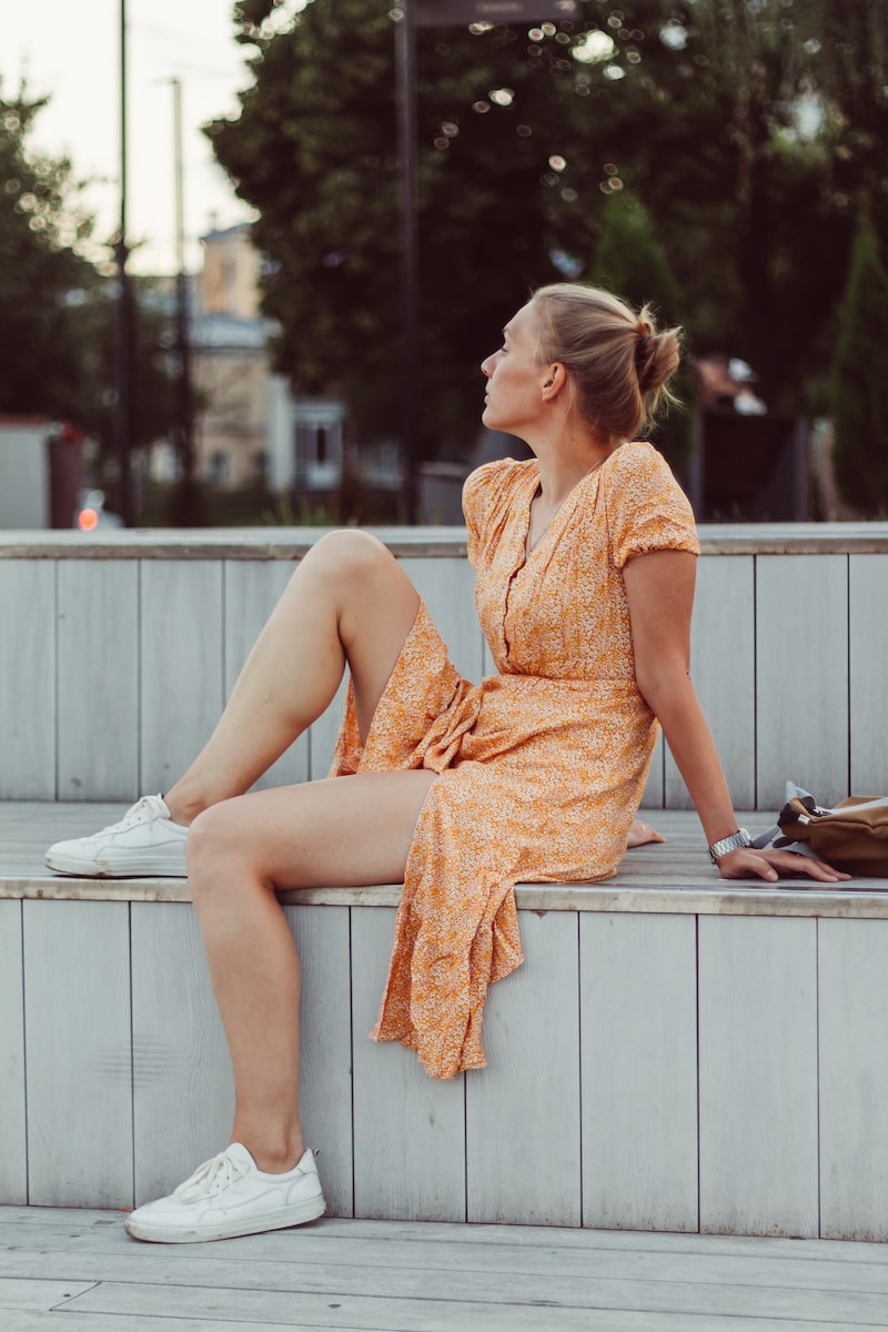 a woman sitting on a bench
