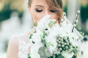 bride smelling the flowers
